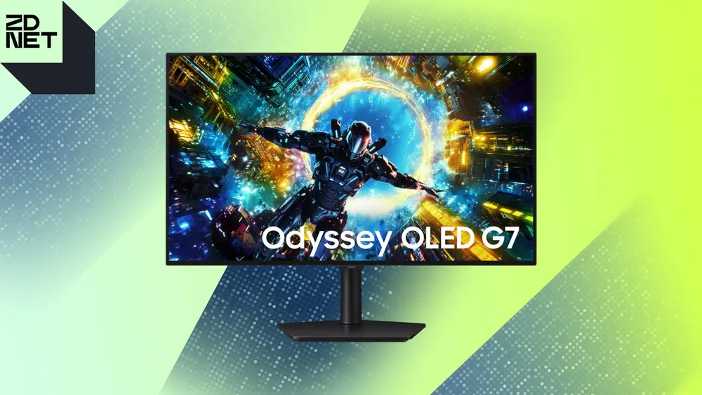 A gaming monitor against a green/black gradient geometric background.