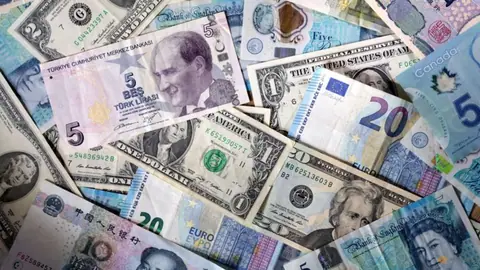 Yen steady before BOJ, AI jitters drive Treasury rally, weigh on dollar