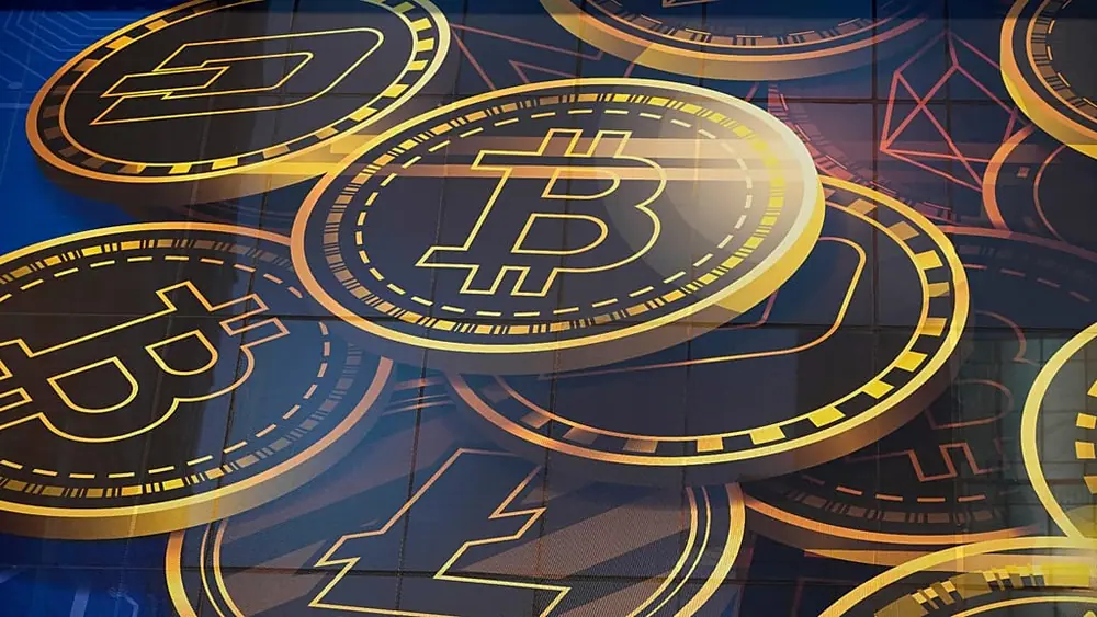 FILE - An advertisement for the cryptocurrency Bitcoin is displayed on a building in Hong Kong on Nov. 18, 2021. (AP Photo/Kin Cheung, File)